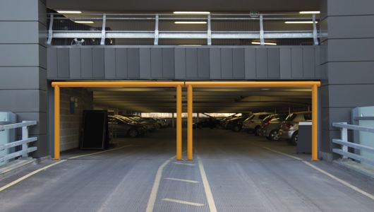 Height restrictor industrial doorway protection in car park