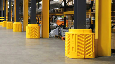 Plastic column guards providing protection in a warehouse