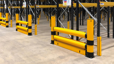 Industrial safety guardrail protecting warehouse assets