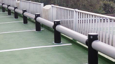 Car park safety guardrail protecting railings
