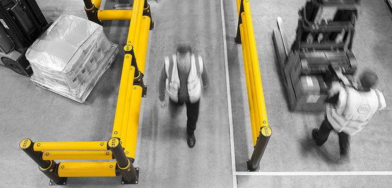 Workplace Safety Guide: Barriers protect people at a busy industrial facility 